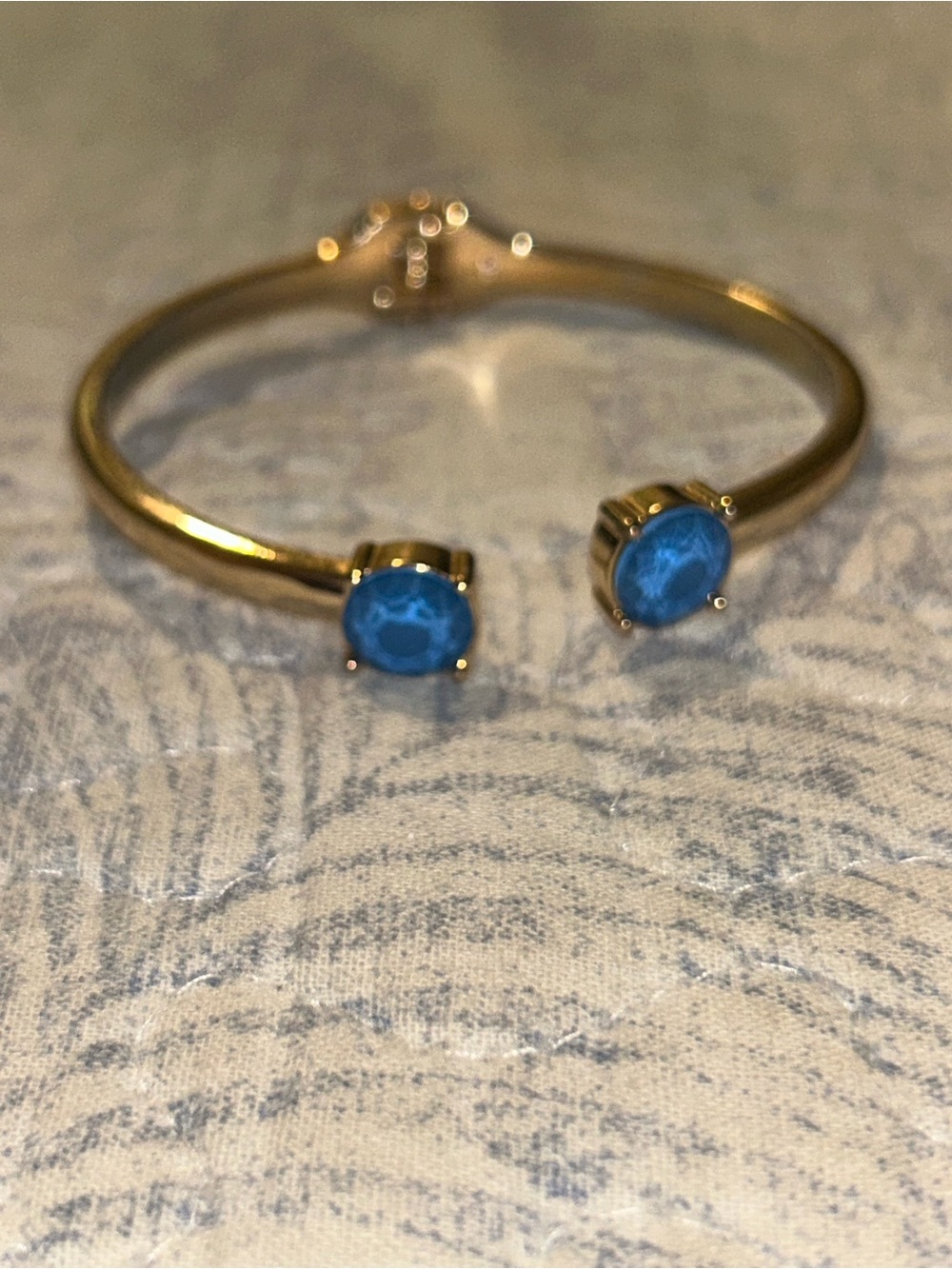 Gold-Tone Cuff Bracelet with Blue Stone Accents